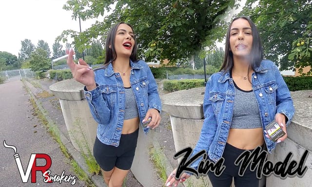 Kim Model poses outdoors in a solo fetish interview for VR Smokers, captured in 60 FPS non POV premium video.